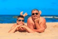 Happy young boy and man on the sea beach Royalty Free Stock Photo